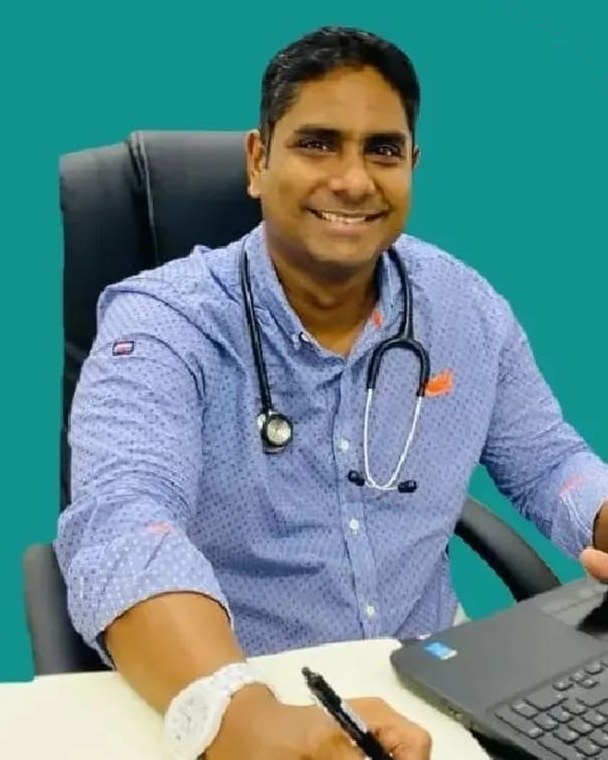 Dr Terence Moodley, General Practitioner in Umhlanga, at his desk